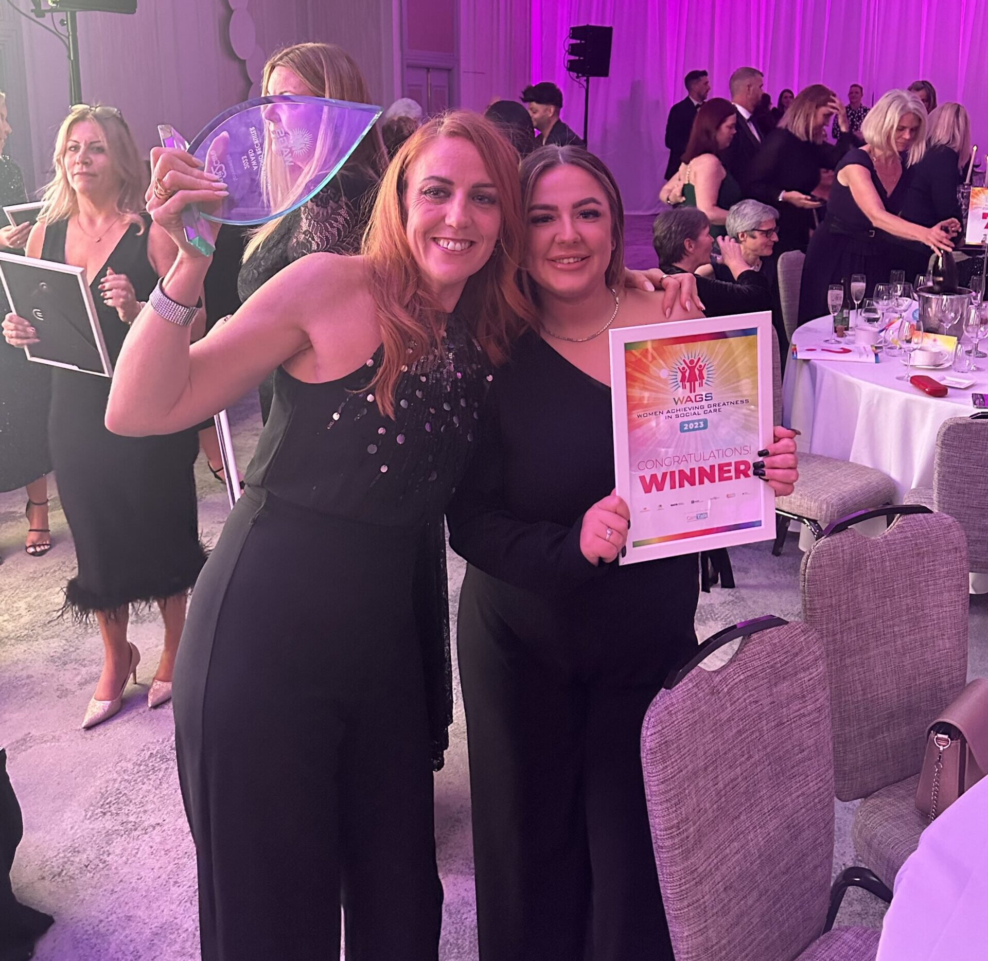Helen and Amber receive their awards