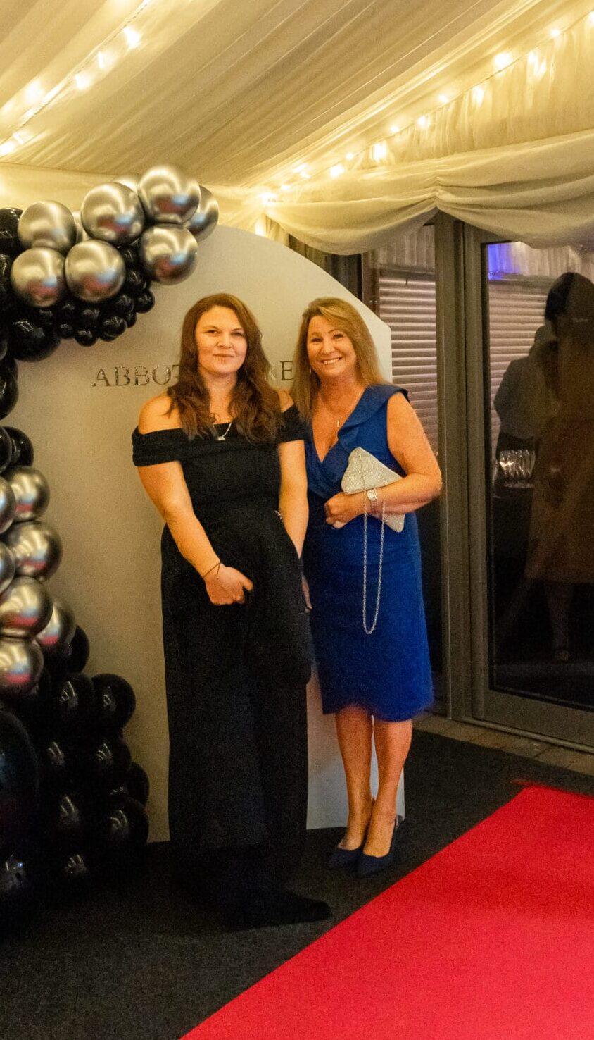 Laura West poses with a friend at the Abbots Care Awards