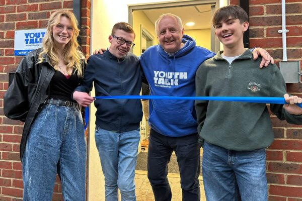 Volunteers from Youth Talk unveiling the new office