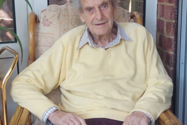Client Peter pictured in his chair at home