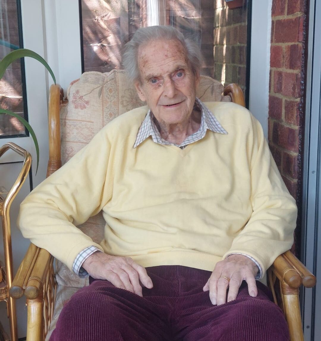 Client Peter pictured in his chair at home
