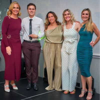 Members of Abbots Care Central Support Team pose after winning the 'combatting social isolation award'