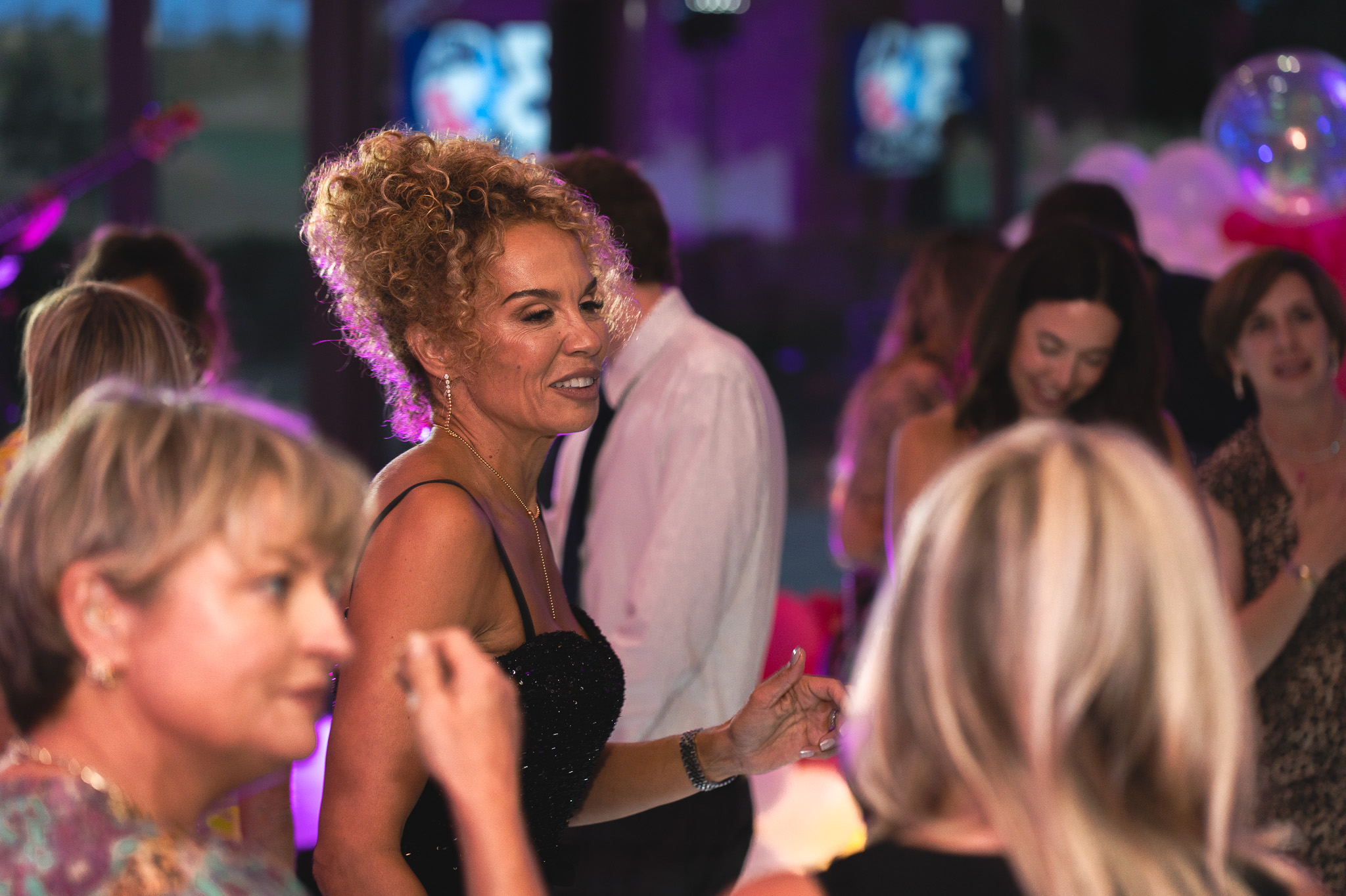 Abbots Care CEO Camille Leavold dancing at Abbots Care's 30th Birthday celebration