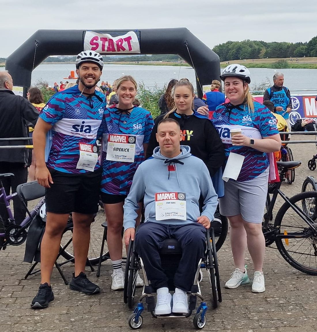 Abbots Care team members posing together before starting the Superhero Triathlon