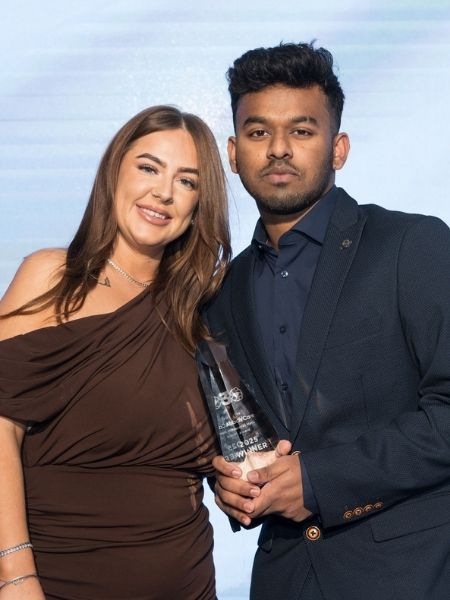 Rafi winning the overseas hero award at the Abbots Care Worker Awards 2025